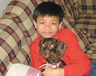 Christion Bi is Mary ComptonÕs adopted son from Vietnam. They live in Poland..