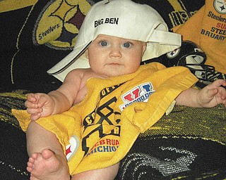 Lanie Rose Joyce of Boardman is posing for some Steelers photos before last yearÕs Super Bowl..