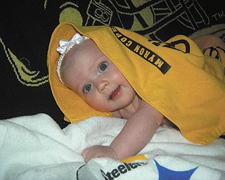 Lanie Rose Joyce of Boardman is posing for some Steelers photos before last yearÕs Super Bowl..