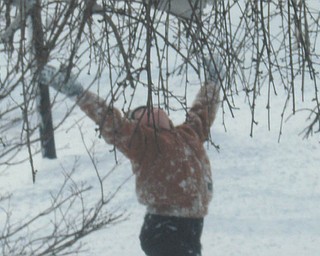 Kurt Caldwell, who turns 7 TODAY, reminds us of the positive of snow. His proud mommy, Kathy, of Youngstown says the picture is worth a thousand words..