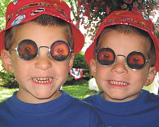 Twins Joshua and Jordan Maggie are goofing around outside in the springtime. Sent by MacKenzie Maggie of New Castle Pa..
