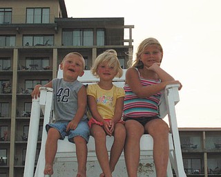 Three little beach bums at Ocean City, Md., in August 2008 are Robby, Hannah and Morgan Kist..