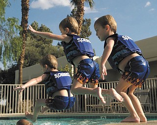 Here is a picture of 4-year-old Nicholas LaPlante jumping into a pool while.visiting his grandparents in Palm Springs, . Calif., a few years ago. His dad, John, took quick, progressive shots as he jumped in and then put them all together for an interesting shot. Makes you look twice!