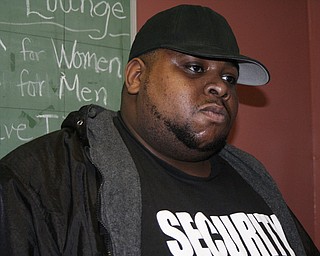 Larry Watkins, known as Big Boy, is all business when it comes to the safety of his patrons. He's a security guard at Love Lounge in downtown Youngstown.