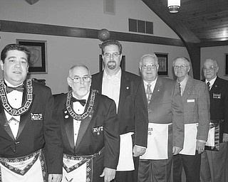 SPECIAL TO THE VINDICATOR
Longtime lodge members honored
Argus Masonic Lodge 545 of Canfield paused during its Feb. 12 meeting at the lodge to pay tribute to 18 longtime members. Recognized during the event for their years of service were: William K. Dressel of Florida and Willard H. Hughes of Canfield, 65 years; Samuel C. Boak of Canfield, M. Dudley Buck of Youngstown and Harold W. Kaser of Delaware, Ohio, 60; William L. Ewald of Ashland, Va., David R. Gibson of Columbiana, Harold J. Grove of Everett, Pa., and Gary L. Smith of Canfield, 50; Jon R. Anstrom, Henry J. Domkowski, Robert J. Jones and Gale W. Reedy, all of Youngstown, Michael D. Boda, Walter A. Coy and David A. Jenkins, all of Canfield, Charles H. Day of Mineral Ridge and Terrance J. Reese of North Lima, all 25. Each honoree received a gold pin, and the 25-year awards were presented by Donald Huntley, who was master of the lodge in 1985. Martin R. Schuller was among the guests. Denny Furman was master of ceremonies. Among those participating in the event were, from left, R. Christopher Gillam, master of the lodge; Huntley, Jones, Reedy, Reese and Schuller.