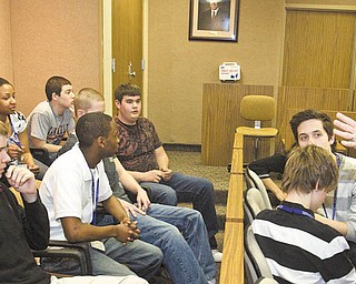 Susan Buttle, youth court coordinator, guides the deliberations of teen jurors from area high schools at the Mahoning County Juvenile Court in the Martin P. Joyce Juvenile Justice Center on East Scott Street. After a defendant admits guilt, a jury of teen peers hears evidence, deliberates and renders a binding sentence. Ten other Ohio counties have teen courts.