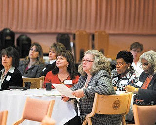 A group of women listen to Edward Hopson, senior partner of Real Estate Capital Partners, speak at Youngstown State University. He was one of the speakers Thursday at the third annual Minority & Female Business Conference.