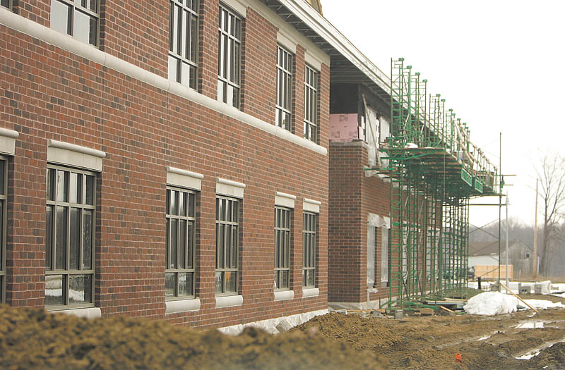 Brick work on the exterior of South Range’s new complex allows the building to begin to take on its character. The $38 million complex will accommodate more than 1,300 students.