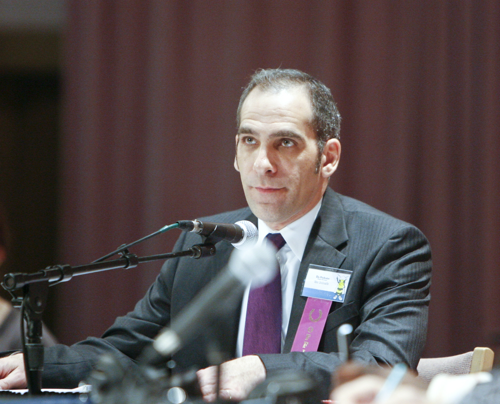 ROBERT K. YOSAY | THE VINDICATOR.. Tim Roberts stepped in as announcer as  Dr Fred Owens PhD.. was delayed in getting to the Bee.in the 2010 -77th Vindicator Spelling Bee was held  at the Chestnut Room at Kilcawley Center at YSU - 30-