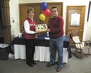 THE VINDICATOR

Salem Preservation Society met on Feb. 4 at Salem Historical Society to celebrate the founding of the organization. To mark the occasion, the birthday cake displayed by, from left, Karen Carter, vice president, and Craig Brown, president, was shared by members during the social hour. The guest speaker was George W.S. Hayes, who spoke on the Salem Sustainable Comprehensive Plan. The club is continuing the sale of Carriage House Books for $22. For more information contact Brown at (330) 332-0388.
