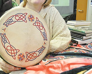 Brigid Kennedy, who has family in County Mayo, Ireland, lived in the Emerald Isle for two years. She shows some items from Ireland including a bodhrán, an Irish frame drum.