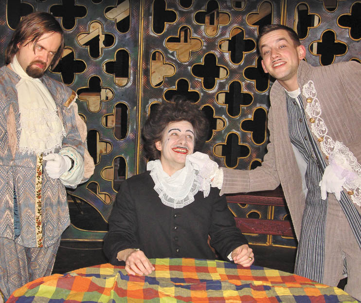 The cast of Kent Trumbull Theater's production of "Tartuffe" gathers in a scene.