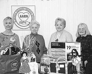 The Vindicator
Alzheimer Network fundraiser
A charity auction, “Valley Memories,” will be presented by volunteers of the Alzheimer Network Saturday at the Fifth Season Banquet Center, 1400 N. Canfield-Niles Road, Mineral Ridge. Doors will open at 6 p.m., and there will be Chinese, silent and live auctions for items donated by area individuals and businesses, including those displayed by, from left, Mary Kay Kollat, Dorothy Leone, Mary Ann Frank and Dorothy Barto. Entertainment will be by Take II. For tickets, call the Alzheimer’s Assistance and Referral Network at (330) 788-9755. Proceeds will fund the Network’s special caregiver education series, research support program, family groups, info-line and public awareness events.
