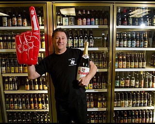 The Vindicator/Geoffrey Hauschild.President of Vintage Estate, Phil Reda, poses for a portait after being named the number one beer establishment in the world according to ratebeer.com, at Vintage Estate along South Ave. on Tuesday afternoon.