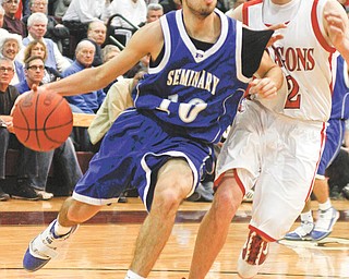 Lisa-Ann Ishihara | The Vindicator --- Poland's Nico Fatimus (10) drives the ball past Niles Dragon's Cory Floyd (2) at Boardman High School during the second period, Monday March 8, 2010