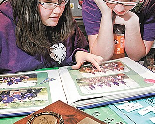 William D. Lewis| The Vindicator  Danielle Yuhas, 14, left, of Boardman and Erin Styka, 13, of Austintown , both members of the Youngstown Tailwaggers 4-H club and were participating 4-H community Day at Lord of Life Luthern Church in Canfield Saturday 3-20-10.