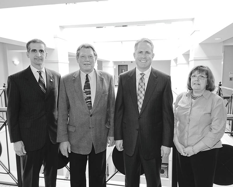 Mark Stahl | The Vindicator: 
Joining forces to promote the upcoming Red Cross Red and White Ball, a major fundraiser for the Mahoning Chapter of the American Red Cross are, from left, Lou Joseph, chapter president; Paul Johnson, co-chair of the ball; Greg Greenwood, honorary chair; and Gail Froomkin, publicity.