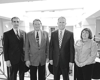 Mark Stahl | The Vindicator:
Joining forces to promote the upcoming Red Cross Red and White Ball, a major fundraiser for the Mahoning Chapter of the American Red Cross are, from left, Lou Joseph, chapter president; Paul Johnson, co-chair of the ball; Greg Greenwood, honorary chair; and Gail Froomkin, publicity.
