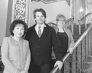 Robert K. Yosay | The Vindicator: Looking forward to a gala evening of fine food, fine wines and fine entertainment during the Stargazer Ball to be presented by Youngstown Symphony Guild are, from left, Florence Wang, event chairwoman; Randall Craig Fleischer, orchestra conductor; and Mercy Komar, guild president.