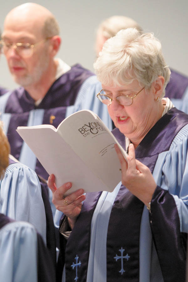 Nancy Sejpner performs as part of the Adult Chancel Choir at Calvary Baptist Church in Boardman. The choir sang “Beyond the Cross,” by Robert Sterling for the church’s Easter Cantata on Sunday evening.