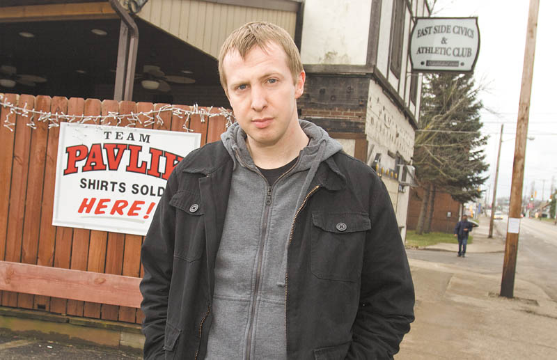 James Rhodes, 31, from England, is in Youngstown to write books about living on the city’s South Side, the Youngstown boxing community and the city’s support of middleweight boxing champion Kelly Pavlik. He is in front of a favorite Pavlik hangout, East Side Civics & Athletic Club, located on South Avenue.