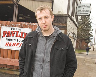 James Rhodes, 31, from England, is in Youngstown to write books about living on the city’s South Side, the Youngstown boxing community and the city’s support of middleweight boxing champion Kelly Pavlik. He is in front of a favorite Pavlik hangout, East Side Civics & Athletic Club, located on South Avenue.