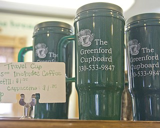 Lisa-Ann Ishihara | The Vindicator ---- The Greenford Cupboard located on the corner of Route 165 and Lisbon Road travel cups