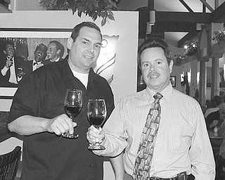The Vindicator: Selecting wines for patrons to sample at a wine-tasting fundraiser to be sponsored by McDonald Lions Club on April 15 are, from left chef Leo DelGarbino and Carl Fossaceca, event coordinator.