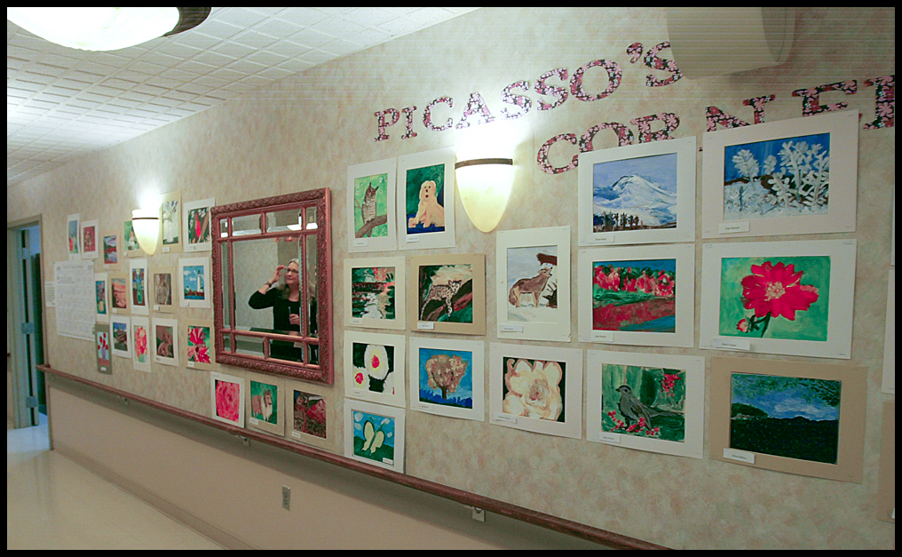 ROBERT K. YOSAY | THE VINDICATOR...The Picasso Corner as resident artists display their work with instructor Suzanne Gray - Residents of Ashley Circle at Briarfield in Austintown paint with instruction from Suzanne Gray. Now they have a little gallery, called PicassoÕs Corner, at the facility, to display their work.-30-.