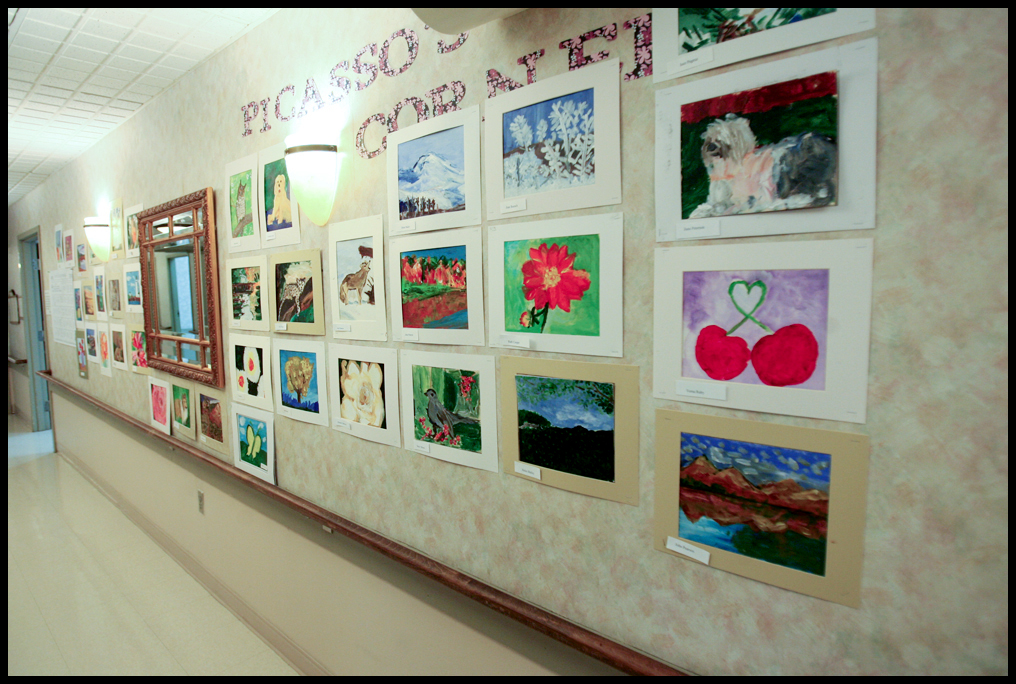 ROBERT K. YOSAY | THE VINDICATOR...The Picasso Corner as resident artists display their work with instructor Suzanne Gray - Residents of Ashley Circle at Briarfield in Austintown paint with instruction from Suzanne Gray. Now they have a little gallery, called PicassoÕs Corner, at the facility, to display their work.-30-.
