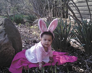 Mia Nicole Jackson, granddaughter of Nikki Hatfield, was 6 months old when this picture was taken on Easter Day in 2009 in front of the Bears Den Cabin in Mill Creek Park, where her family has had Easter get-together every year for over 25 years. She is the 4th generation of the family to celebrate Easter in the park..