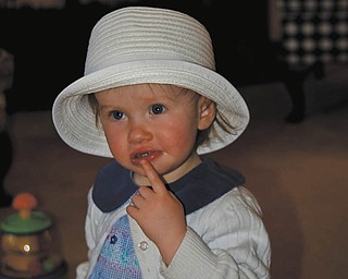 Cora Rodgers of Beaver, Pa., was 17 months old in this Easter 2009 picture. She is baby signing ÒI need a cookie.Ó She is the granddaughter of Carol and Dan Shields.of Canfield.