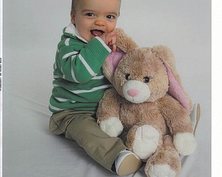 James George Lipanic, 7 months old, of Boardman, thought this bunny looked good enough to eat on his first Easter..