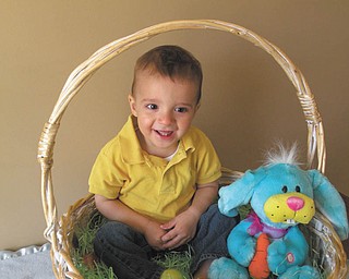 16-month-old Mason McClure, son of Michael and Michelle McClure of Struthers is enjoying some time with the Easter Bunny..