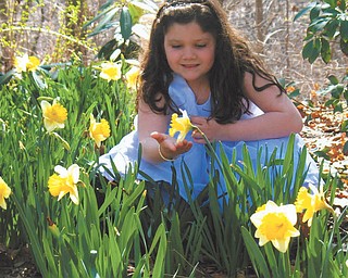This is Julie Carino, 8, at Fellows Riverside Garden. Sent by her mom, Gayle Carino of Austintown.