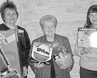 The Vindicator: Displaying a few of the items to be featured at a Chinese auction at Ursuline Center on April 18 are members of Mill Creek Chapter of the ABWA, from left, Kathy Novak; Judy Codespote, chapter president; and Joyce Billock.