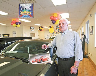 Bobby Thomas, a GM Lordstown retiree, checks out vehicles in the showroom of Spitzer Chevrolet in North Jackson. Thomas traded in his Chevrolet Impala earlier this year and bought a used Pontiac while he waits on the Lordstown-build Cobalt. He plans on buying one when they hit showrooms later this year.