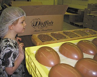 Savannah Wymer, daughter of Marion and Jeff Burns of North Lima, was one of several children and adults during a tour at DaffinÕs Candy Factory in Sharon, Pa., to see how Easter candy is made..