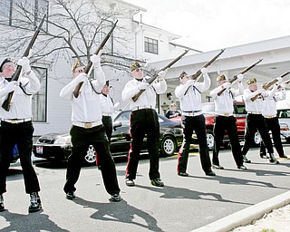 William D. Lewis | The Vindicator Members of Newton Falls Veterans Honor Guard fire a 21 gun salute during funeral service for Joshua Sherbourne, one of 3 Marine recruits, killed in a traffic accident. Services were held at Carl W. Hall Funeral Home in Warren Monday..