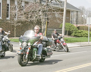 William D. Lewis | The Vindicator Motocycles lead funeral procession for Joshua Sherbourne, one of 3 Marine recruits, killed in a traffic accident. Services were held at Carl W. Hall Funeral Home in Warren Monday.