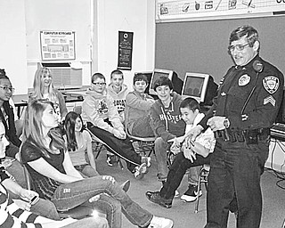 The Vindicator: A Substance Abuse Prevention program was presented recently for pupils in the seventh- and eighth-grade classes at St. Patrick School in Hubbard. The difference between street and medically prescribed drugs, the reasons people abuse drugs and the consequences of making bad choices with drugs were explained by, right, Sgt. Lou Carsone of the Hubbard City Police Department. The program also included a video documentary about the life of a person with a life-changing drug problem and a question-and-answer session.