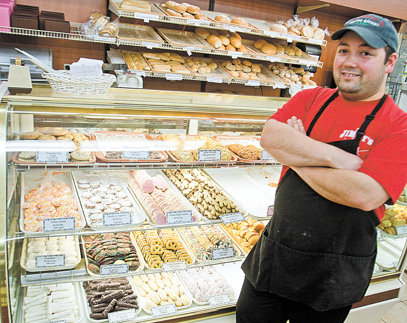 Frank Occhibove literally grew up in the aisles of Jimmy’s Italian Specialties, which his parents started in his grandfather’s garage on West Federal Street in Youngstown in 1974. Here Occhibove, manager of the store on Belmont Avenue in Liberty, stands in front of its bakery.