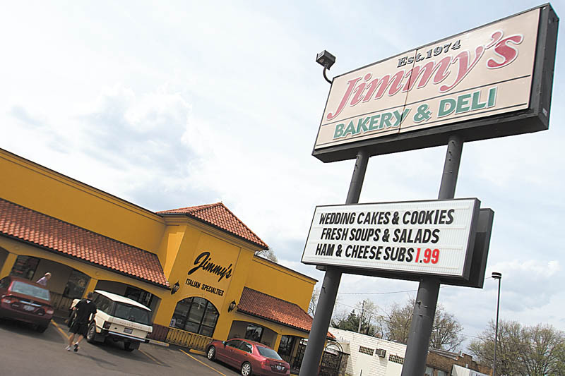 The new location, which moved from a site across the street three years ago, features a more elaborate bakery, deli, pizza shop and grocery store. 