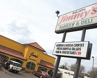 The new location, which moved from a site across the street three years ago, features a more elaborate bakery, deli, pizza shop and grocery store.
