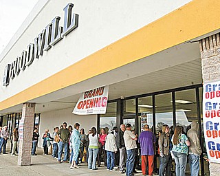 A line of about 150 people waited Thursday morning outside the new Austintown Goodwill location in the Austintown Plaza. The store’s grand opening continues through Saturday, and all donated merchandise is 50 percent off.