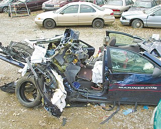 Three Trumbull County Marine Corps recruits died after this Pontiac G6 was struck March 31 by a tractor trailer truck on state Route 5 in Leavittsburg. The damage shown here was caused not only by the crash, but also by the Jaws of Life and other equipment used to free the occupants.