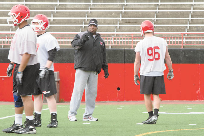 Youngstown State assistant football coach Ron Stoops said the transition to coaching college players after so many years in high school is getting easier every day.