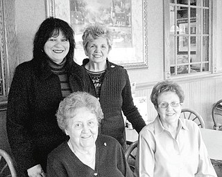 The Vindicator: All set for the recognition dinner to be sponsored by the Yo-Mah-O Chapter of International Association of Adminstrative Professionals are, from left, seated, Marie Sammartino and Carmella DiGaetano, and standing, Olga Rivera and Bonnie Filipovich, club members.