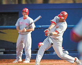 Geoffrey Hauschild|The Vindicator.YSU's Jeremy Banks (3) hits a single during the top of the ninth inning of a game at Kent State's Schoonover Stadium on Wednesday afternoon.