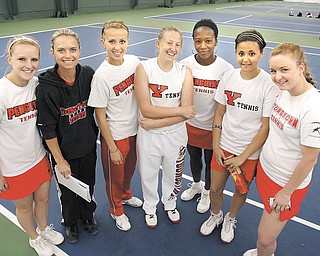 Members of the Youngstown State tennis team. From left, Nicole Haralambopoulos, head coach Michele Grim, Anna Volkova, Lauren Hankle, Tanisha Welch, Hannah Patten and Margarita Sadovnikova. The women hope senior leadership, provided by Haralambopoulos, Volkova and Welch, will help the Penguins to succeed in the Horizon League tournament later this month. The Penguins (6-12) have played all of their Horizon League
foes already this season, and hope that experience can give them an edge in the tournament.
